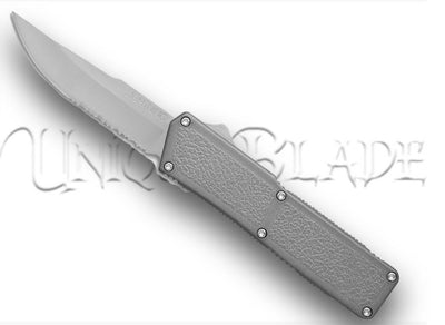 Lightning Out The Front Automatic Switchblade - Gray Silver Serrated: A versatile and stylish gray-silver OTF knife featuring a serrated blade for added cutting precision and functionality.
