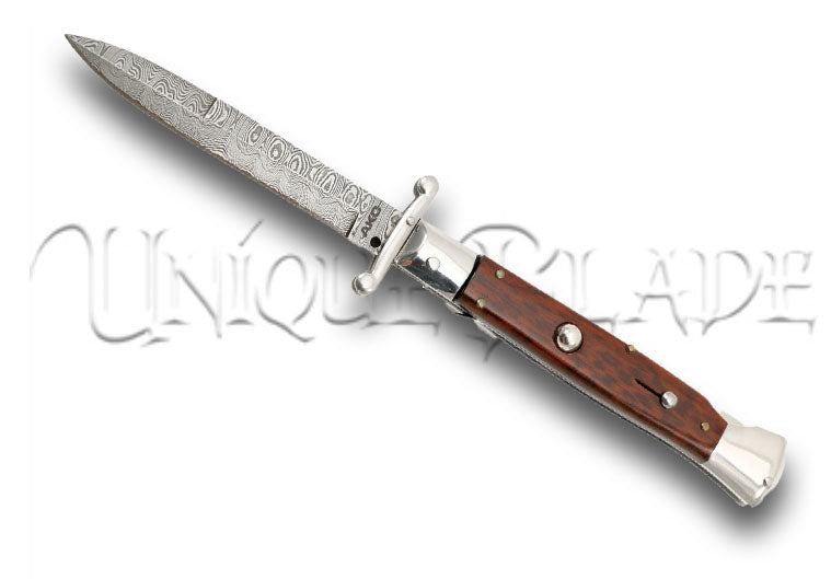 9" AKC Italian Swinguard - Snakewood Handle, Damascus Blade - A fusion of elegance and craftsmanship. This automatic knife showcases a stunning snakewood handle paired with a precision-crafted Damascus blade.