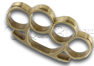 Brass Fist Duster Paper Weight - Merge form and function with this brass knuckle-inspired paperweight, adding a touch of strength and style to your workspace.