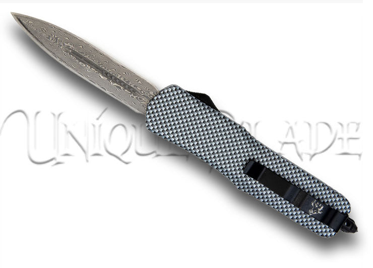Free Runner Damascus OTF Out the Front Automatic Knife - Experience the cutting-edge design with this out-the-front automatic knife, featuring a Damascus steel blade for exceptional performance and style.