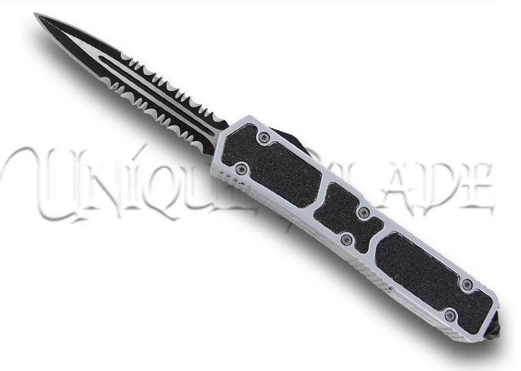 Sleek and Tactical Silver Fox Tarantula Auto OTF Glass Breaker Knife: Black Serrated Blade for Precision Cutting – A reliable tool for various situations.