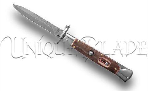 AKC Real Italian Swinguard Stiletto Switchblade - Damascus Blade, Stag Horn Handle - Genuine craftsmanship in every detail. This automatic knife features a striking Damascus blade and an authentic stag horn handle.