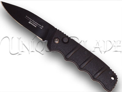 Boker Kalashnikov 74 Automatic Knife - All Black PE - Unleash tactical precision with the iconic Kalashnikov design, featuring an all-black, partially serrated edge for versatile cutting power.