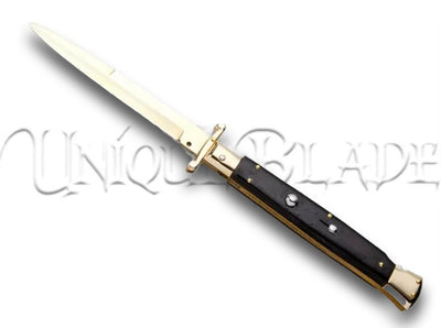 Frank B. 11" Ebony Italian Stiletto Swinguard Gold Plated: Bayo Gold - Experience opulence in Italian design with this swinguard stiletto, featuring an ebony handle, gold-plated accents, and a distinctive bayonet-style gold blade.